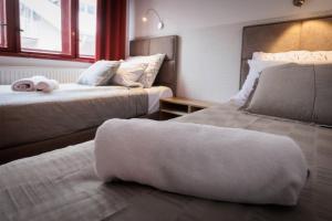 Cama o camas de una habitación en Apartments Pia