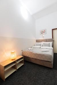 Cama o camas de una habitación en Apartments Pia