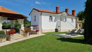 Vonkajšia záhrada v ubytovaní Holiday Apartment VILLA BIANCA