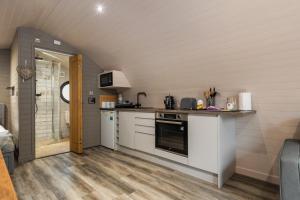 Kuchyň nebo kuchyňský kout v ubytování Calon + 22 fotografií