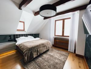 Łóżko lub łóżka w pokoju w obiekcie Top Mountain Villa