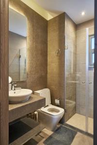 a bathroom with a toilet and a sink and a shower at 3bds with private heated pool in Sholan 2 ElGouna in Hurghada