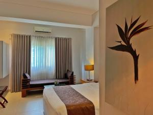 Postel nebo postele na pokoji v ubytování Aloha Boracay Hotel
