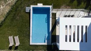 Fotografia z galérie ubytovania Villa Mare - Private Pool, 4 Bdrms, Sea View, BBQ v destinácii Hanioti