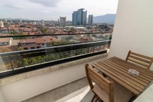 A balcony or terrace at Gran Capital Top Central Apartment