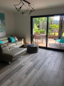 Posezení v ubytování Appartement cosy au calme