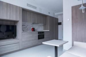 A kitchen or kitchenette at Apartamentos Las Torres
