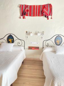Cama o camas de una habitación en Casa Sara