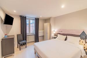 Postel nebo postele na pokoji v ubytování Hotel Herckmans