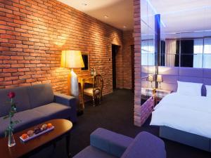 Posteľ alebo postele v izbe v ubytovaní Hotel Betmanowska Main Square Residence Adults Only + 37 fotografií