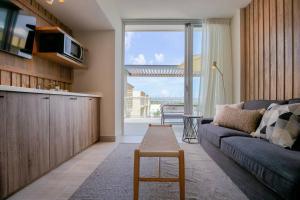 Posezení v ubytování Amazing Apartment with Rooftop Jacuzzi at Bayahibe - Vibe Residences 3BDR