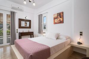 Posteľ alebo postele v izbe v ubytovaní Villa Muse