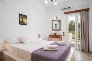 Posteľ alebo postele v izbe v ubytovaní Villa Muse