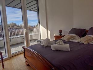 Posteľ alebo postele v izbe v ubytovaní Le nid du lac d'Annecy