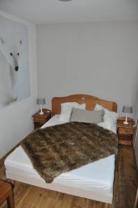 Ein Bett oder Betten in einem Zimmer der Unterkunft Appartment Peisey Les Arcs 6-8 pers comfort cosy pool sauna 50 meter from piste