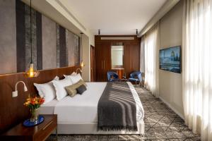 Μια τηλεόραση ή/και κέντρο ψυχαγωγίας στο Olive Tree Hotel