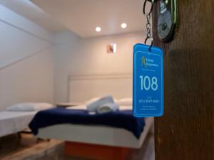 Hotel Supreme - Pistão Sul - Próximo ao Taguatinga Shopping客房内的一张或多张床位