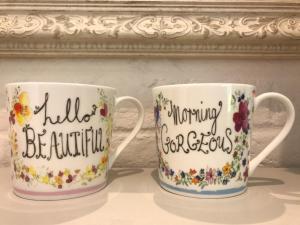 two coffee mugs with the words full beehive and morning beethoven at The Studio in Wisborough Green