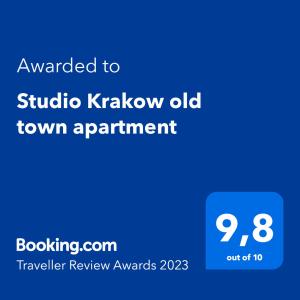 a screenshot of a phone with the text awarded to studio krakow old town at Studio Krakow old town apartment in Krakow