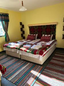 Säng eller sängar i ett rum på Къща за гости Становец