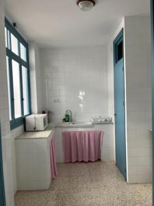Kuchyňa alebo kuchynka v ubytovaní Bonito apartamento céntrico cerca de Sevilla