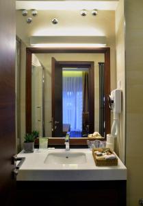 Et badeværelse på Belgreat Premium Suites