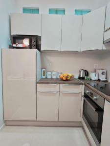 Kuchyň nebo kuchyňský kout v ubytování Balance appartment - Le Locle