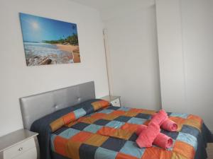Postel nebo postele na pokoji v ubytování Apartamento Playmar Almeria