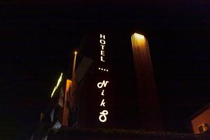 a building with a sign on the side of it at Hotel NIKS in Sevlievo