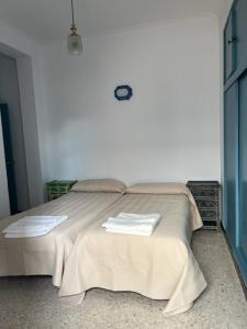 Posteľ alebo postele v izbe v ubytovaní Bonito apartamento céntrico cerca de Sevilla