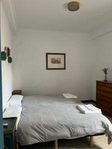 Posteľ alebo postele v izbe v ubytovaní Bonito apartamento céntrico cerca de Sevilla