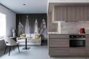 A kitchen or kitchenette at Apartamentos Las Torres