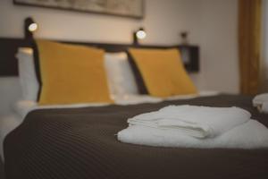 Posteľ alebo postele v izbe v ubytovaní Raba92 Apartman House
