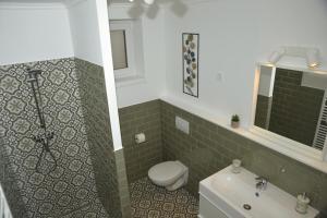 Kúpeľňa v ubytovaní Raba92 Apartman House