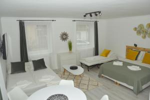 Posedenie v ubytovaní Raba92 Apartman House