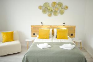 Posteľ alebo postele v izbe v ubytovaní Raba92 Apartman House