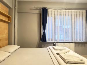 Postel nebo postele na pokoji v ubytování beydağı suit