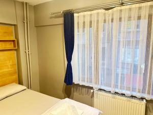 Postel nebo postele na pokoji v ubytování beydağı suit