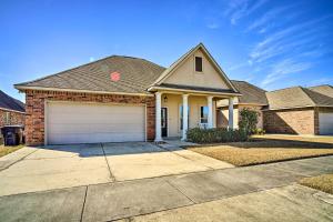 a brick house with a garage at Baton Rouge Vacation Rental about 4 Mi to LSU in Baton Rouge