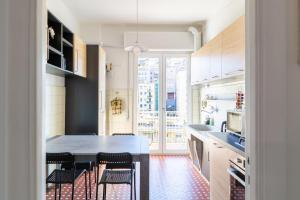 Кухня или мини-кухня в Moderno Appartamento Sampierdarena/Centro
