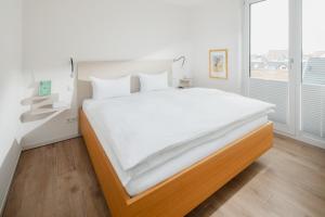 Ліжко або ліжка в номері Penthouse NorderNice