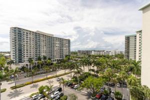 a view of a city with palm trees and buildings at Luxury Stylish Oceanfront 2 bedroom 2 bathroom in HOLLYWOOD FL in Hollywood