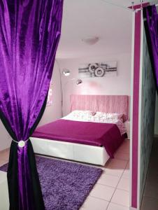 Ένα ή περισσότερα κρεβάτια σε δωμάτιο στο Casa Vacanze JANAS I.U.N P3605