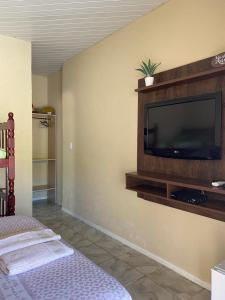Et tv og/eller underholdning på Bella Vista Suítes