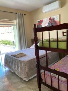 En eller flere senge i et værelse på Bella Vista Suítes