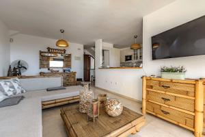 TV a/nebo společenská místnost v ubytování Casa del Mar