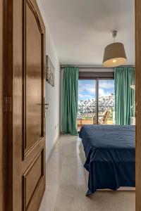 Postel nebo postele na pokoji v ubytování Casa del Mar