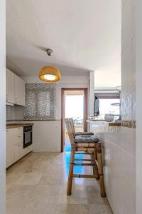 Kuchyň nebo kuchyňský kout v ubytování Casa del Mar