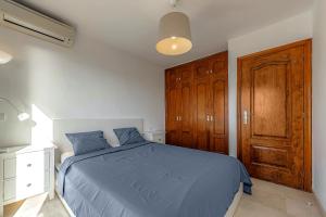 Postel nebo postele na pokoji v ubytování Casa del Mar