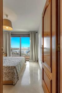 Postel nebo postele na pokoji v ubytování Casa del Mar